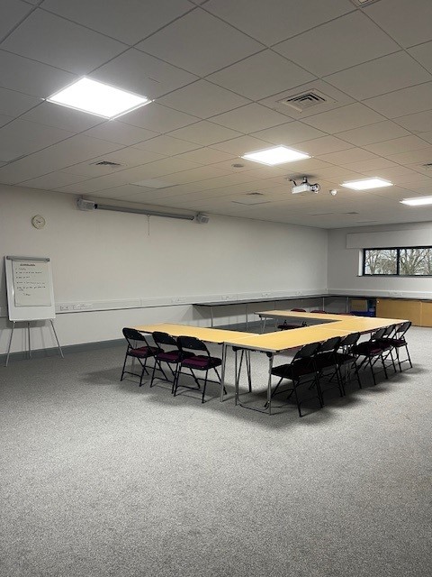 Training room arranged in a flexible meeting layout